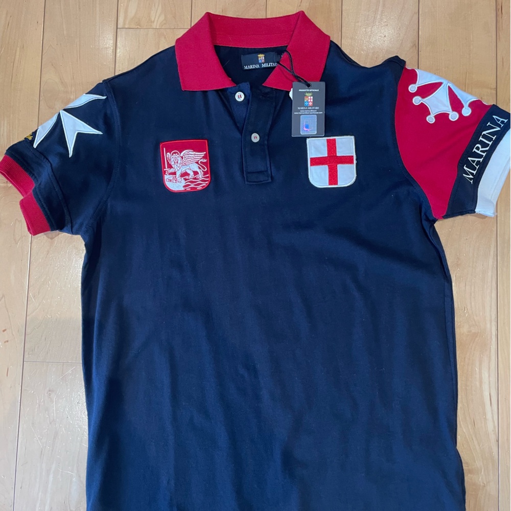 Classic Blue Polo Shirt with Red Accents and Emblem